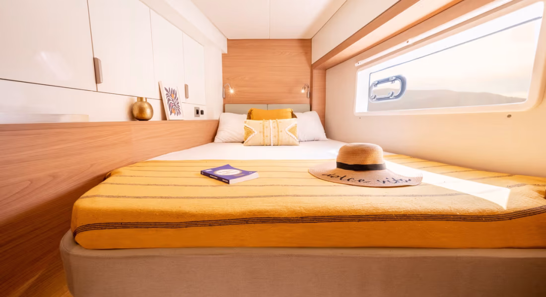 9_Guest_cabin_double_bed_yellow_d173ab8c8f
